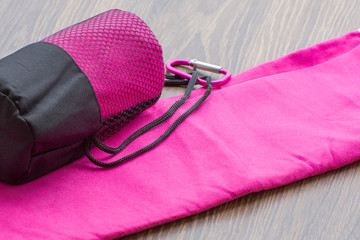 Naklejka premium Pink microfiber towel for fitness and outdoor walks.