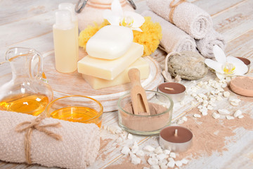 Fototapeta na wymiar oils for a home spa, pumice, natural soap chocolate facial mask, pumice,