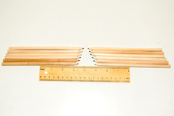 Hexagon Shaped Pencil color and wooden Ruler on isolate white background.
