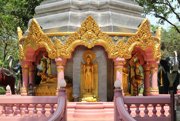 Buddha statue in a  golden chedi in the Erawan Museum a  private museum, Samut Prakan province, Thailand.