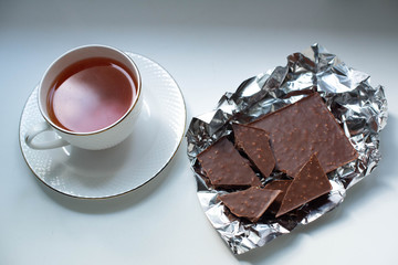 black tea and milk chocolate in foil