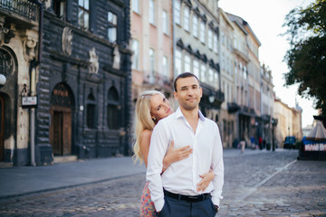 Loving couple walking in the city. Lviv