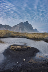 The Vestrahorn mountain on the Icelandic coast jut directly out of the ocean