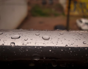 rain drops on the metal of house