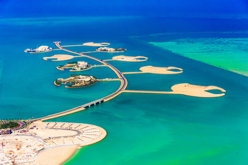 Aerial view of Isola Dana in the Pearl of Qatar in Doha, Qatar - obrazy, fototapety, plakaty