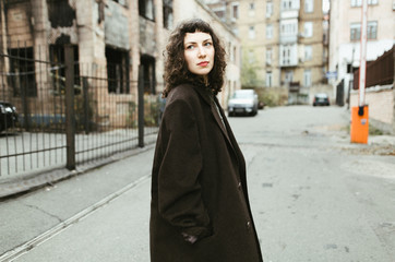 Elegant young woman portrait in the street in Kiev, Ukraine