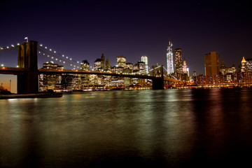 Naklejka na ściany i meble A winter night panorama of the Brooklyn bridge