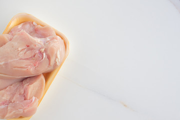 Chicken fillet, fresh chicken meat close-up with a pink tinge. The concept of healthy eating, slimming