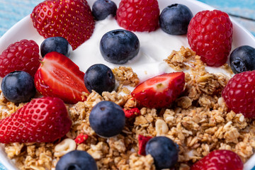 Muesli with greek yogurt on the table