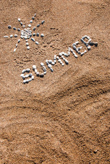 Fototapeta na wymiar Summer picture from pebble and sand on a beach