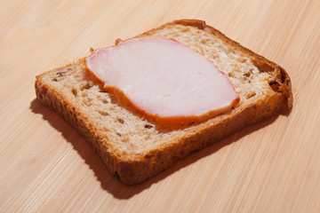 A simple homemade sandwich. Bread and ham