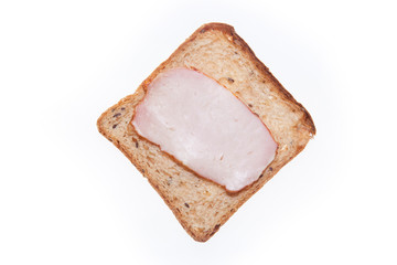 A simple homemade sandwich. Bread and ham