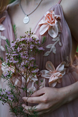 wedding rings and bouquet of flowers