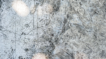 Old concrete wall, natural texture. Light background. The shadows.