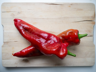 Fresh red pepper on a cutting board