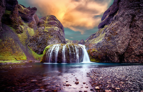 Amazing Icelandic Landscape. Scenic image of fairy-tale canyon of river before Stjornarfoss Waterfall. Stjornarfoss waterfall is one famous natural landmark and travel destination place of Iceland