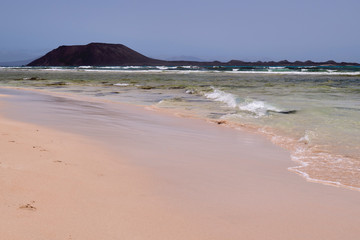 Beautiful view of the sea and the beach of the dunes of Corralejo