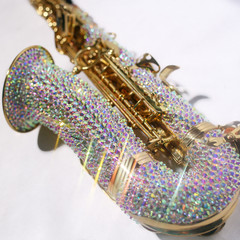 gold saxophone in silver rhinestones, close angle