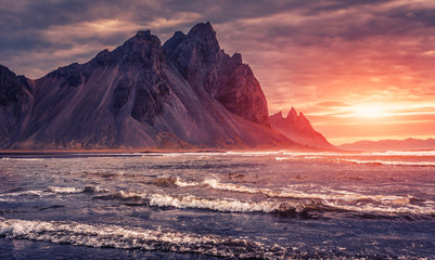 Impressive Colorful Seascape of Iceland. Wonderful picturesque Scene. Dramatic colorful sky glowing...
