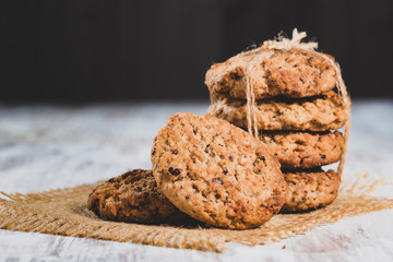 oatmeal cookies on wooden background, close-up