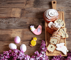 Easter holiday dessert table with pastries and cookies .