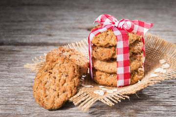oatmeal cookies on wooden background, close-up