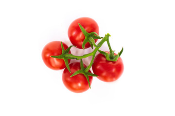Fresh red cherry tomatoes on the white background