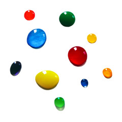 Coloured drops of water on white background