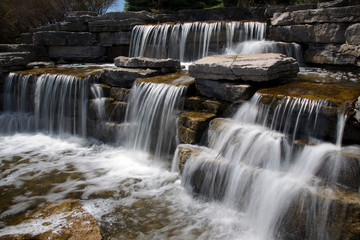 spring - flowing water - waterfall in the public park at Richmond Hill, Ontario, Canda