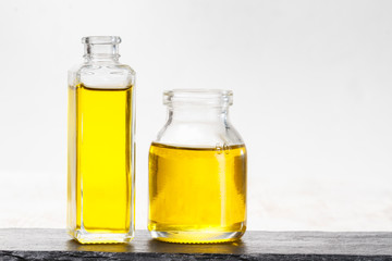 bottle with natural oil, isolated on white background