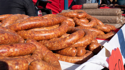 Sausages for sale on the street .