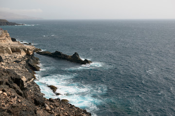 Fototapeta na wymiar Beautiful view of the sea from the top of a cliff in Fuerteventura