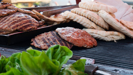 Burgers and buns ready for sale - Street food sales. Meat festival.