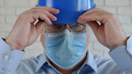 Confident Image with an Engineer Wearing Face Protection Mask Against Viruses.
