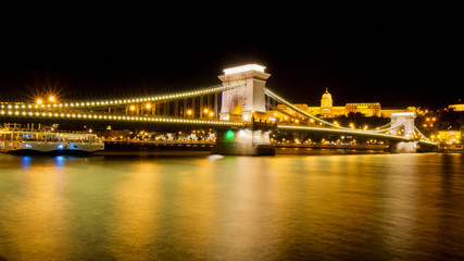 Beautiful night cityscape panorama with stunning illuminated Chain bridge and Buda castle at dawn, Budapest, Hungary, Europe