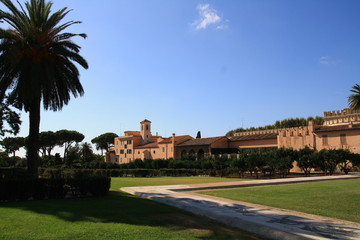 Fototapeta na wymiar View with Italian town. roman landscape with palms