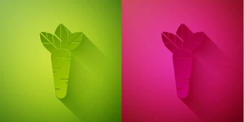 Paper cut Carrot icon isolated on green and pink background. Paper art style. Vector