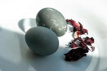 red flowers and black easter eggs