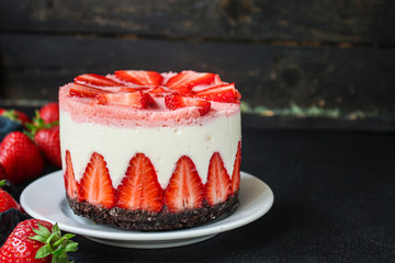 cheesecake strawberrie, sweet mascarpone dessert cake with berries Menu concept healthy eating serving. food background top view copy space for text