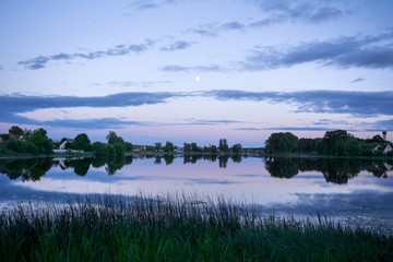 calm as a mirror lake at even better time. purple sky