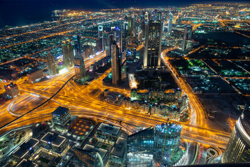 view of Dubai from above from the observation deck of the Burj Khalifa on the Sheikh Zayed highway, Persian Gulf at night