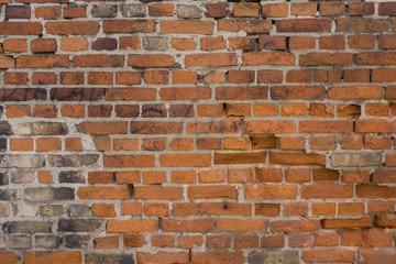 old, frayed yellow brick wall texture, background