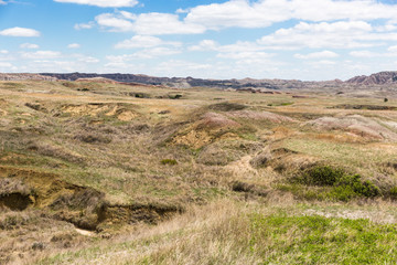Fototapeta na wymiar Landscape view of colorful mounds in South Dakota's Badlands National Park.