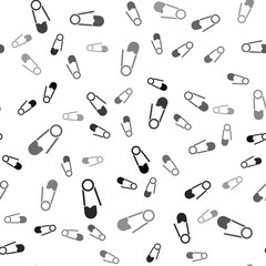 Black Classic closed steel safety pin icon isolated seamless pattern on white background. Vector