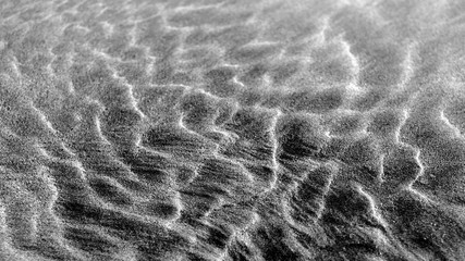 Sand wave. Sand patterns. Black and white.