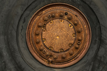 old rusty wheel of a excavator machine