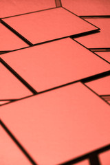 Abstract background created with square-shaped mirrors arranging them according to symmetrical lines, the concept of technological environment.