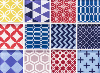 Obraz premium Ceramic mosaic tiles with multi-colored squares for the design of the kitchen of the bathroom or pool.