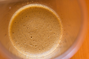 dalgona coffee a cool fluffy whipped coffee latte with coffee foam