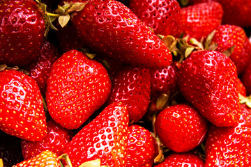 Background from freshly closeup strawberry, top view